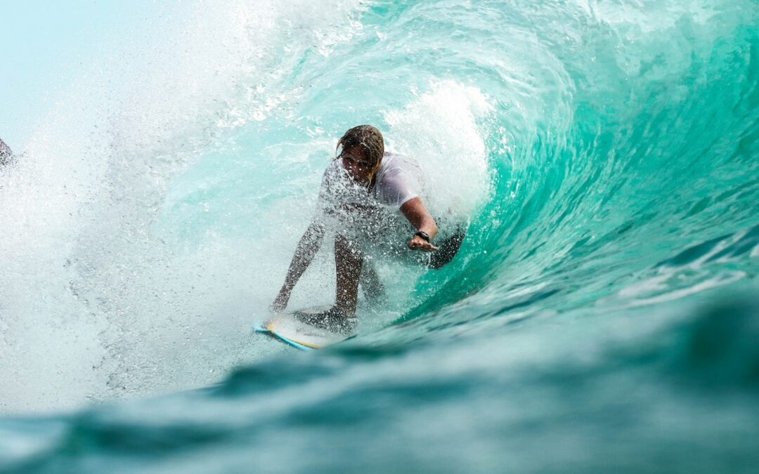 time lapse photography surfer in wave water