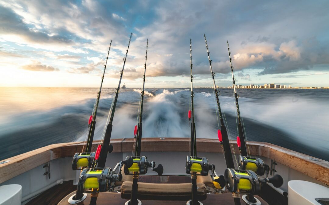 six black-and-yellow fishing rod in boat